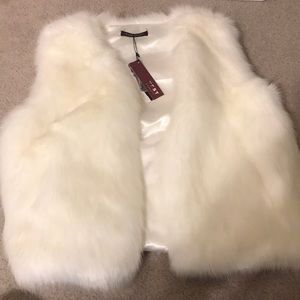 White faux fur vest